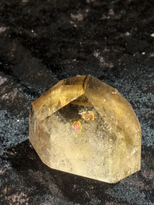 Close comparison showing color interplay between citrine and tiger's eye under daylight