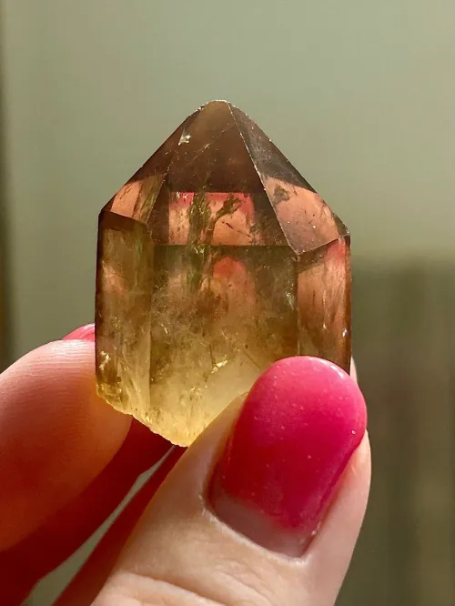 Topaz and citrine jewelry pieces under different lighting conditions