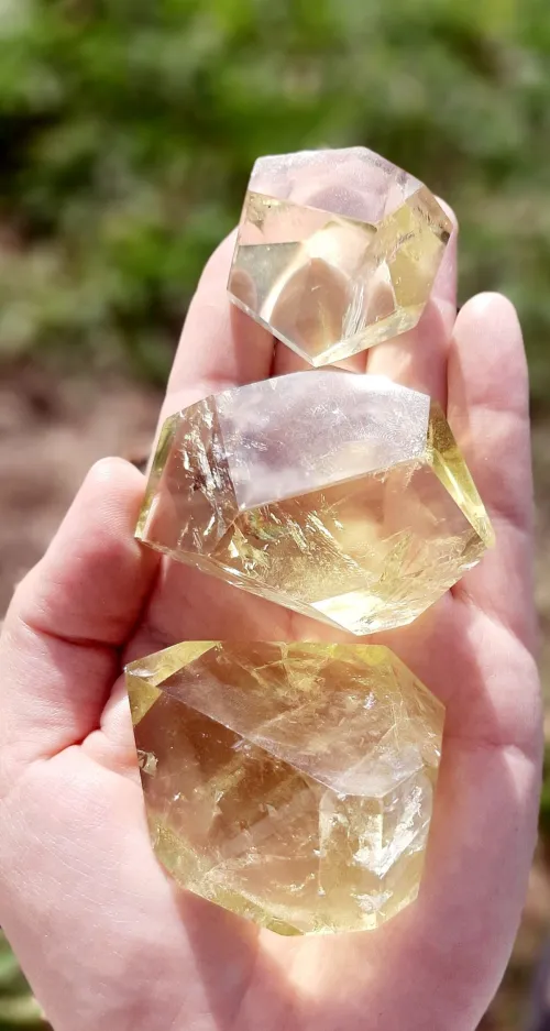 Close-up view of topaz and citrine inclusions and internal characteristics under magnification