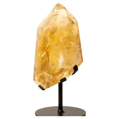 Side-by-side comparison of natural citrine with subtle zoning vs. uniformly colored heat-treated citrine